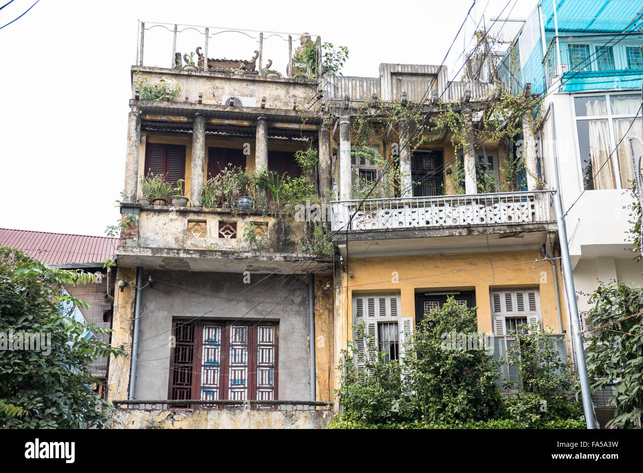 An old french colonial building in the city of Hanoi, Vietnam. The old