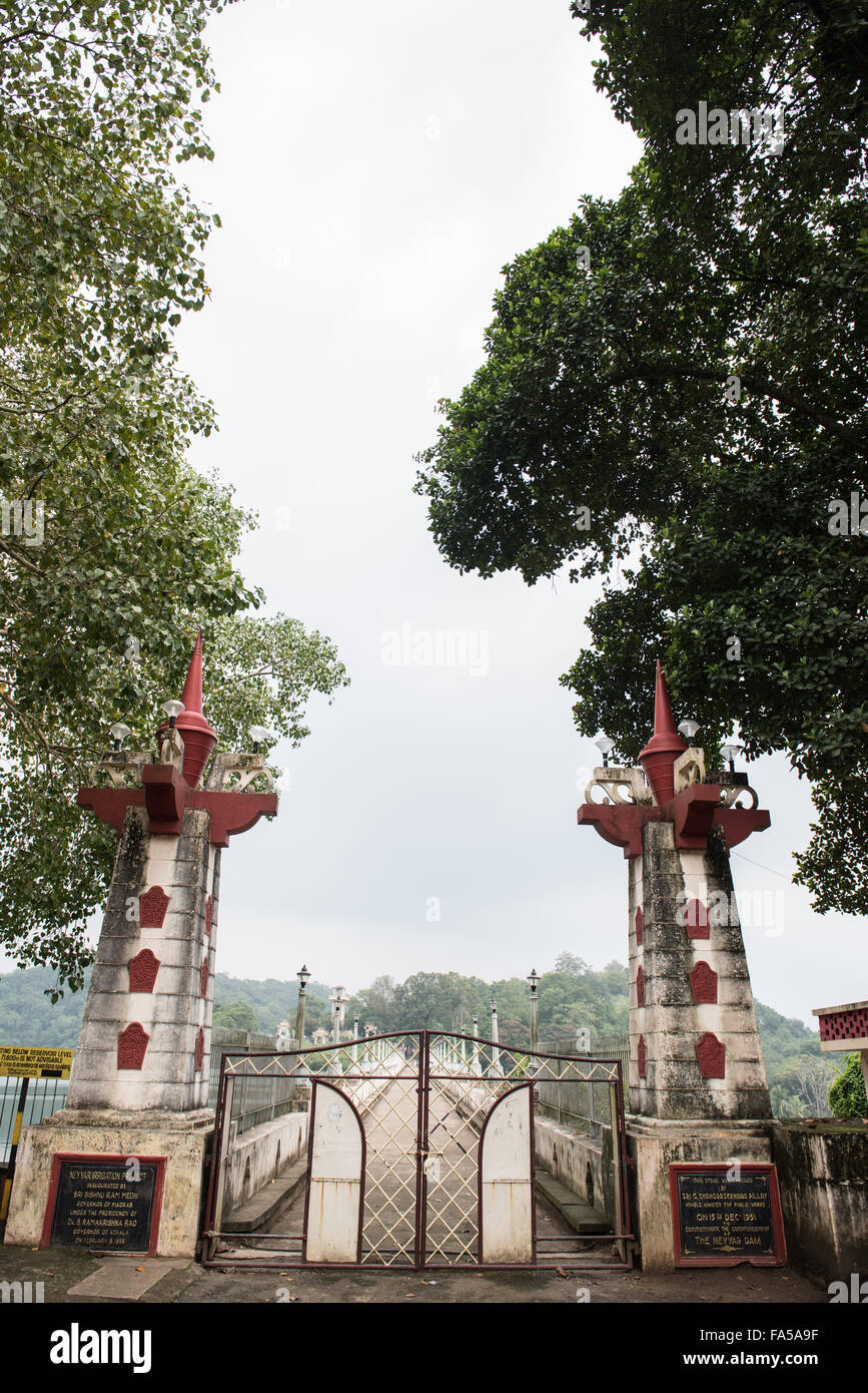 Couple of pillars at the entrance of the Neyyar Dam in Thiruvananthapuram, Kerala. The bridge leading to the Neyyar dam is seen  Stock Photo