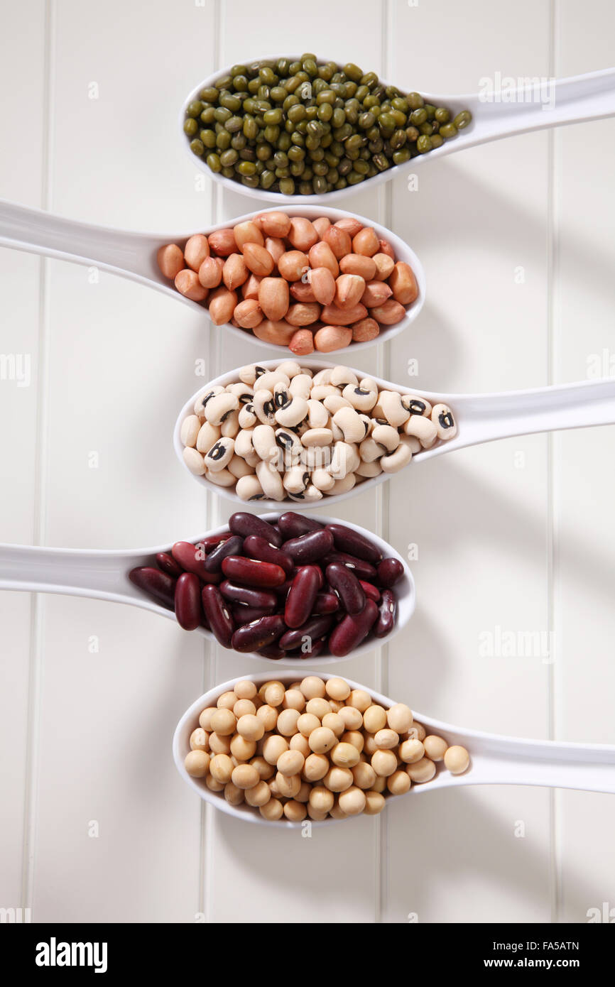 variety of beans group in five spoons Stock Photo Alamy