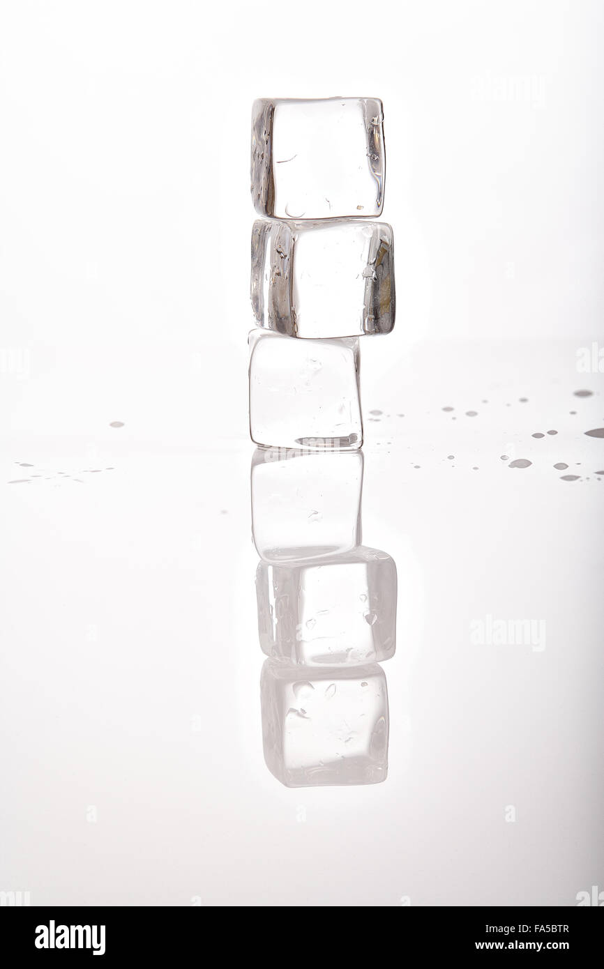 ice cubes on white background Stock Photo - Alamy
