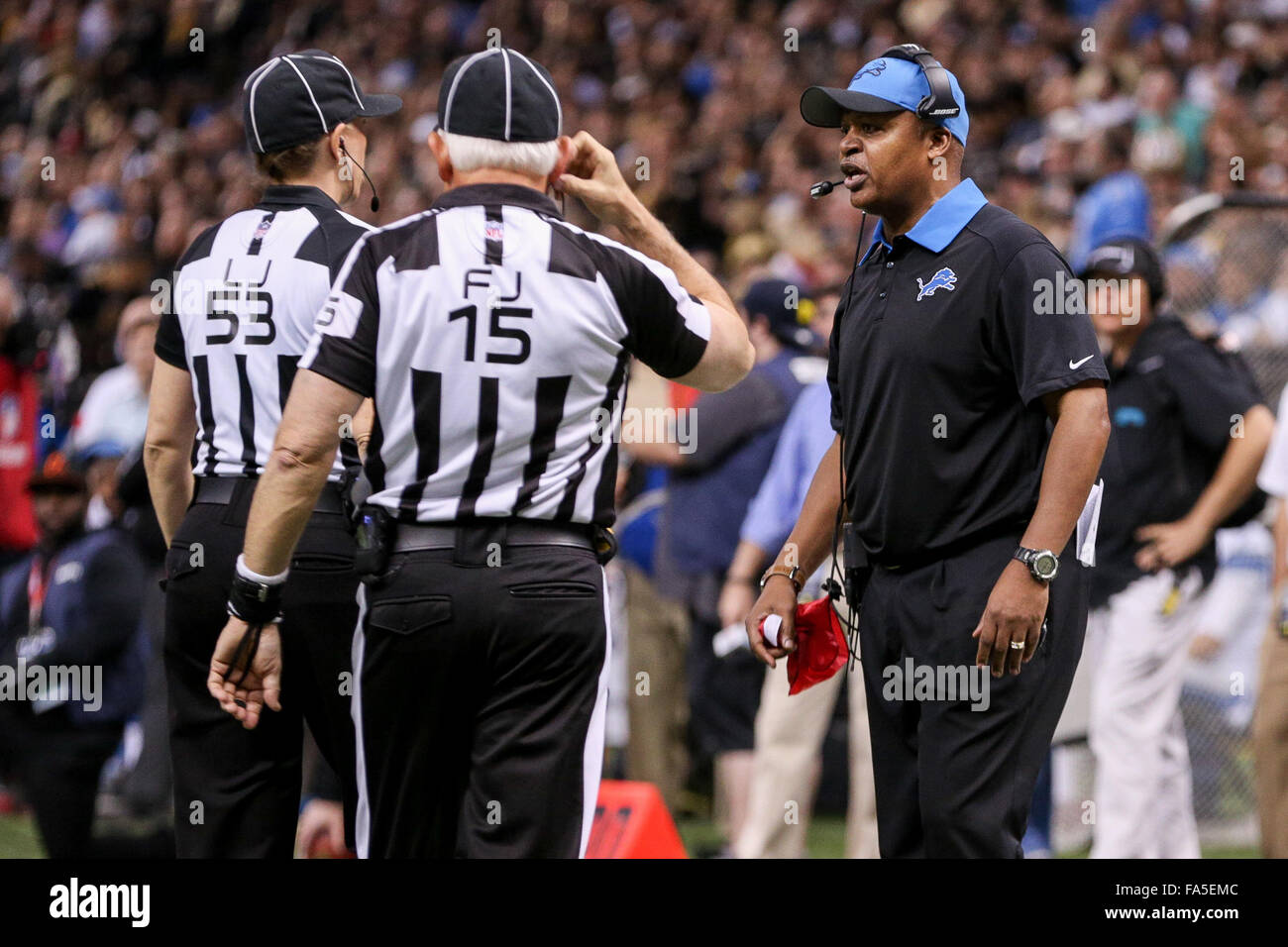 New Orleans, Louisiana, USA. 21st Dec, 2015. Detroit Lions head coach Jim Caldwell challenges a play during the game between the New Orleans Saints and the Detroit Lions at the Mercedes-Benz Superdome in New Orleans, LA. Detroit Lions defeated New Orleans Saints 35-27. Stephen Lew/CSM Credit:  Cal Sport Media/Alamy Live News Stock Photo