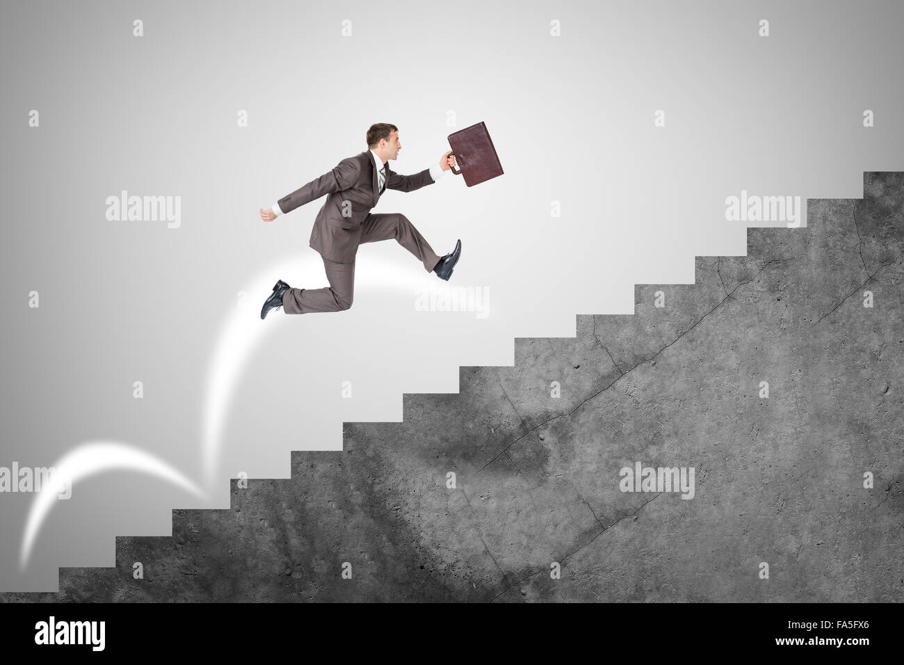 Businessman running up stairs Stock Photo - Alamy