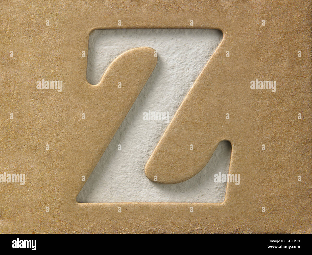 cut out alphabet z on the brown cardboard Stock Photo