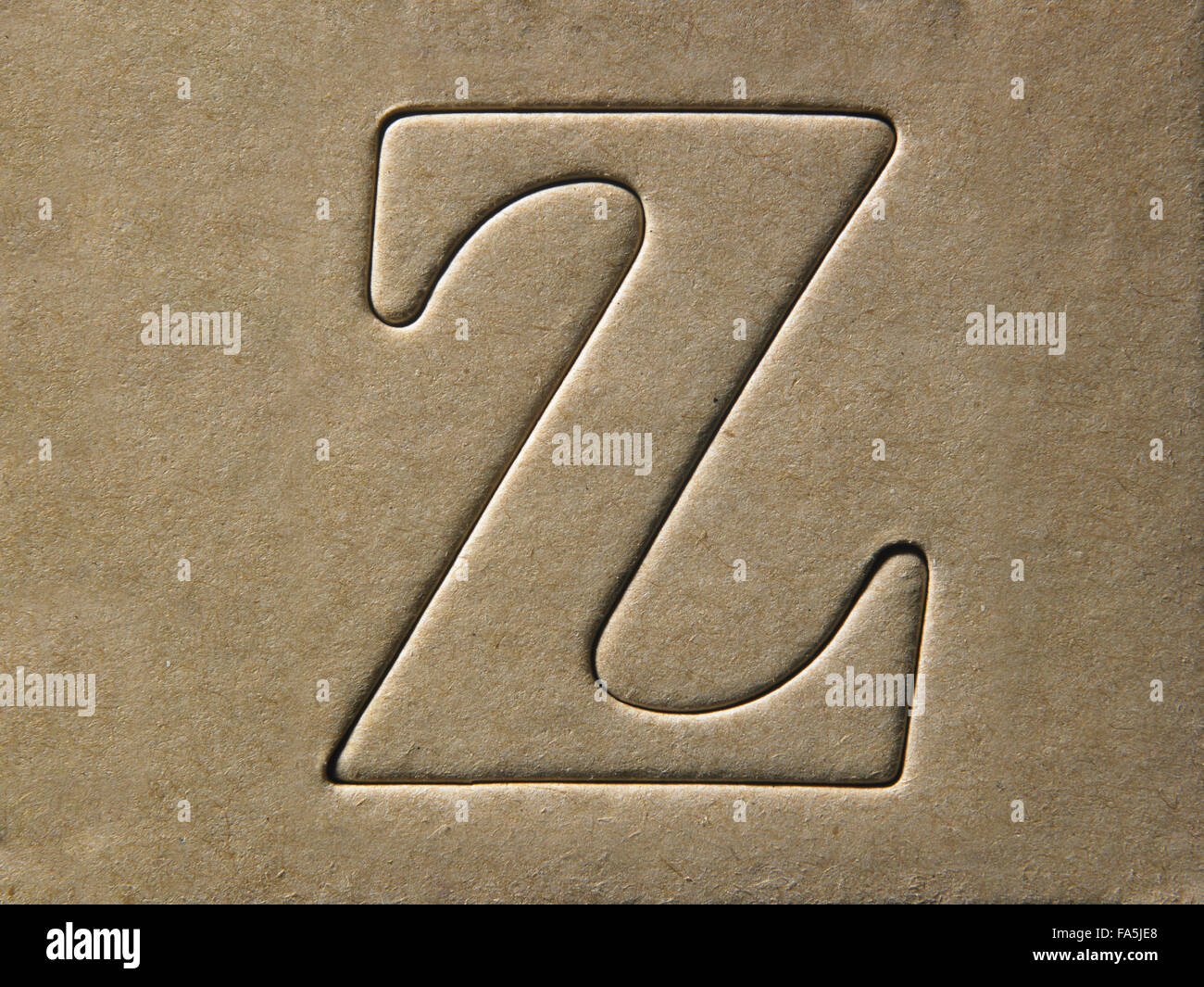 die cut alphabet z on the brown card board Stock Photo
