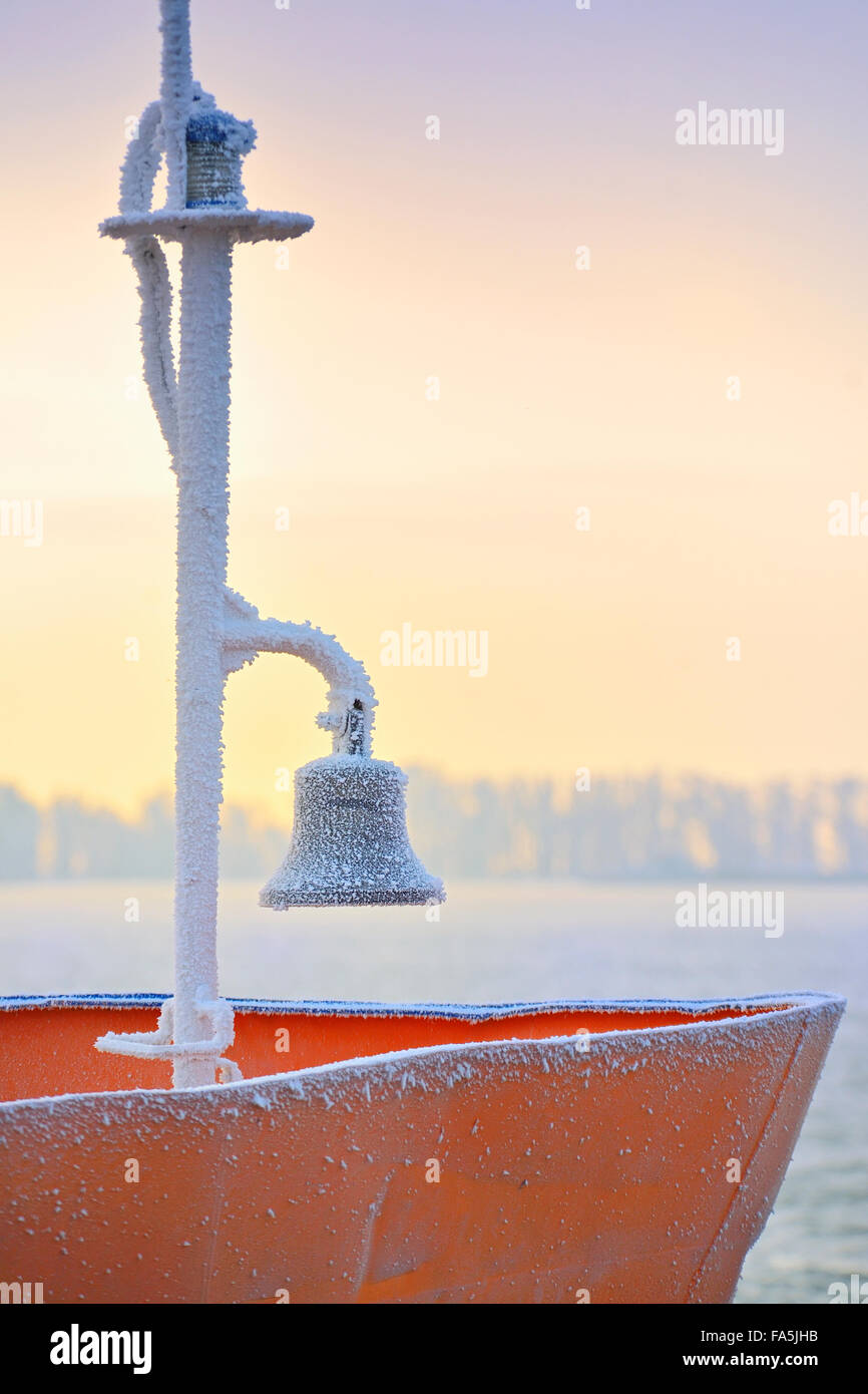 frozen ship bell in winter time Stock Photo