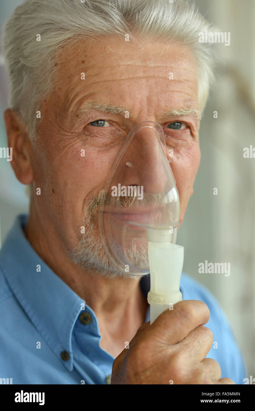 Elderly man with flu inhalation Stock Photo Alamy