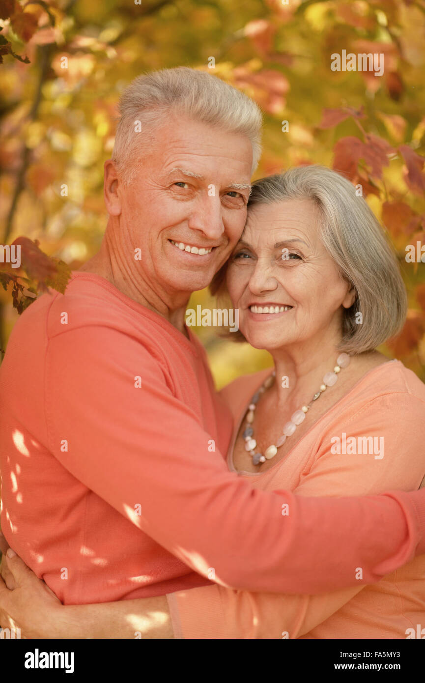 Senior couple in autumn park Stock Photo - Alamy