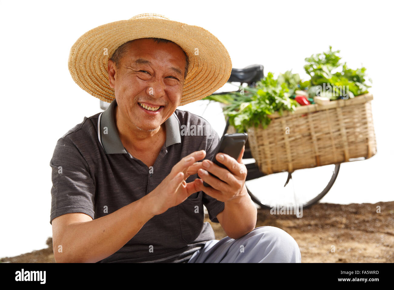 Farmers Use Mobile Phones Stock Photo Alamy