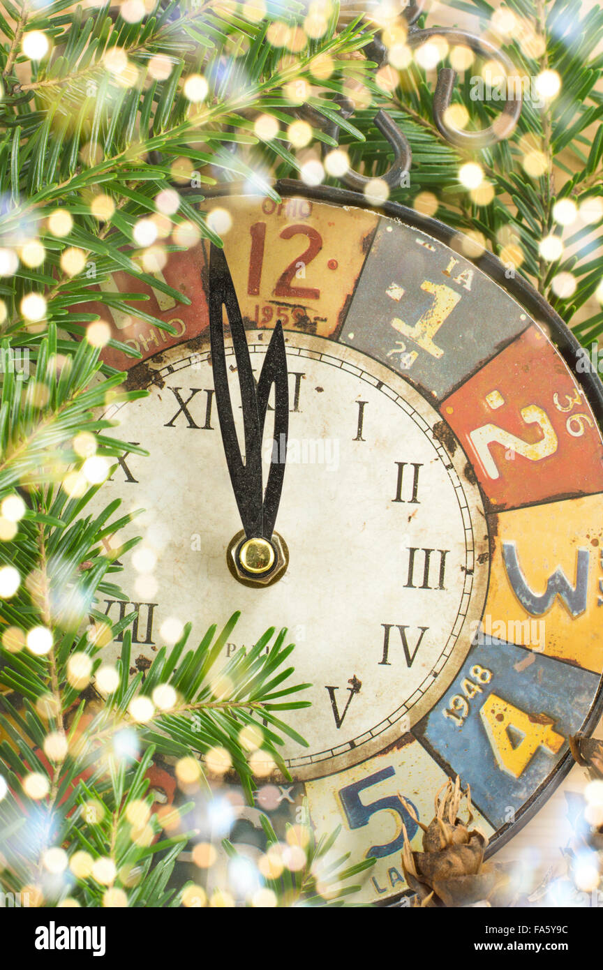 Vintage clock and shiny holidays lights Stock Photo