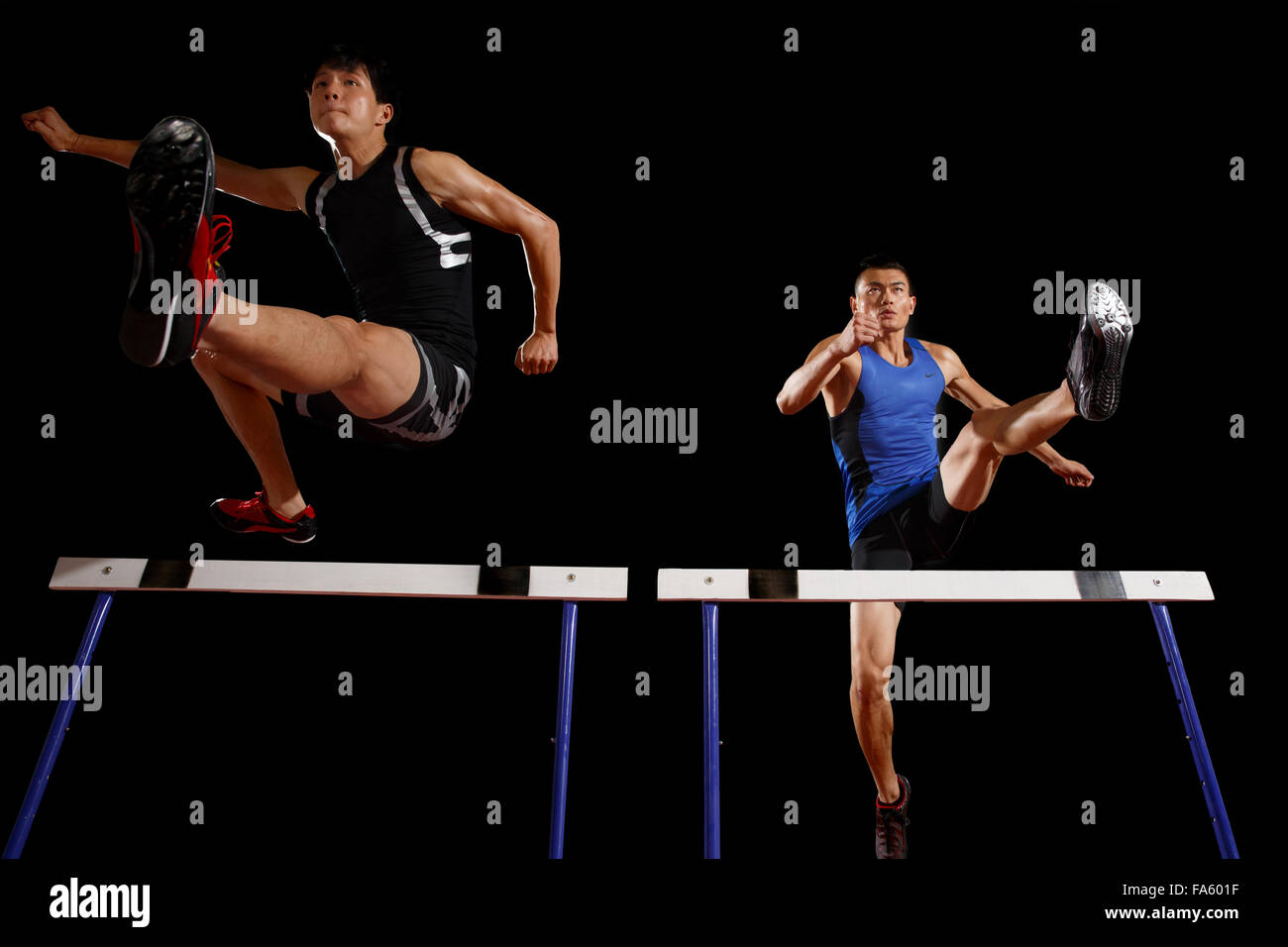 Track and field athletes in Hurdles Stock Photo Alamy