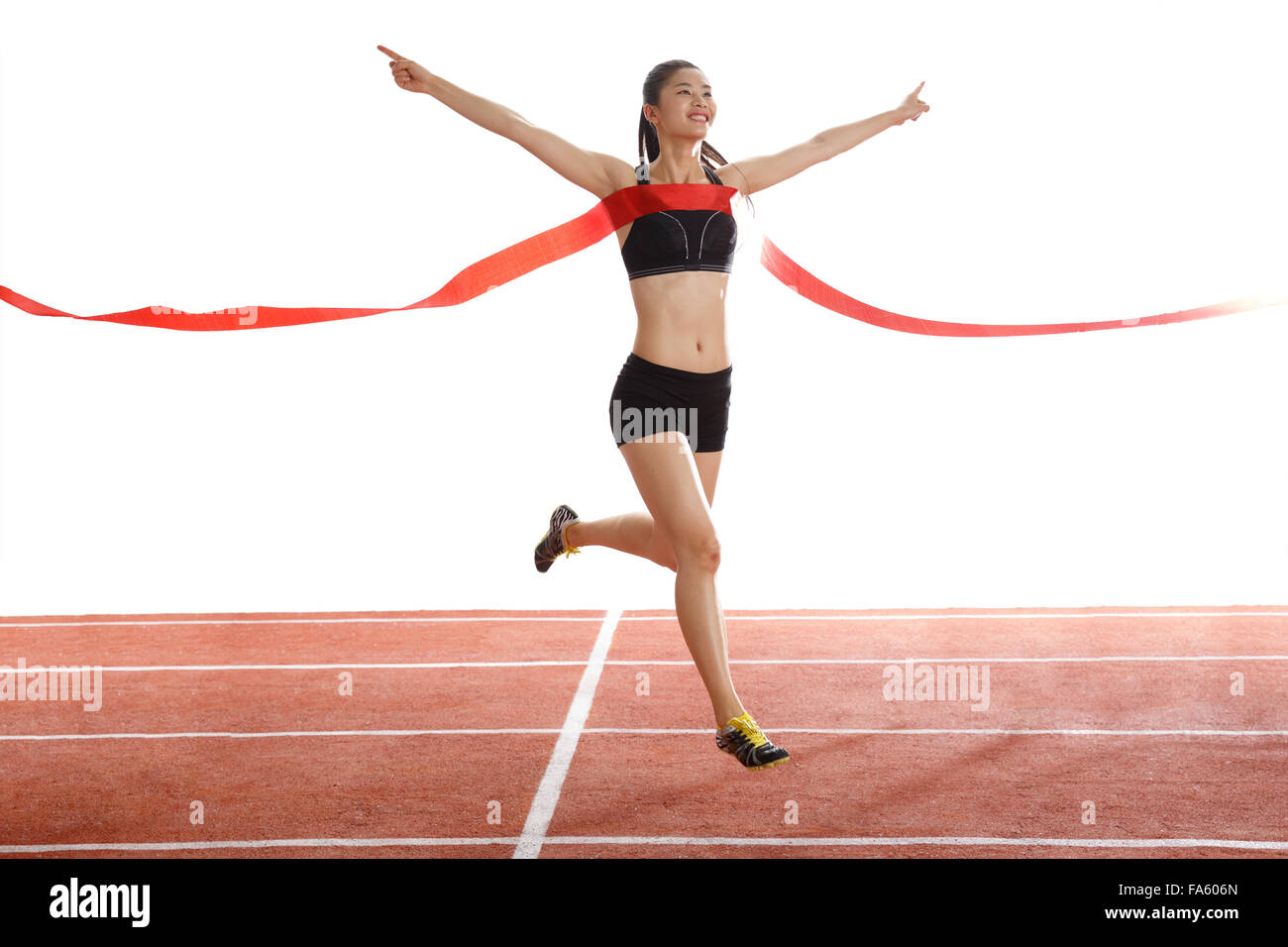 Athlete finishing line run Cut Out Stock Images & Pictures - Alamy