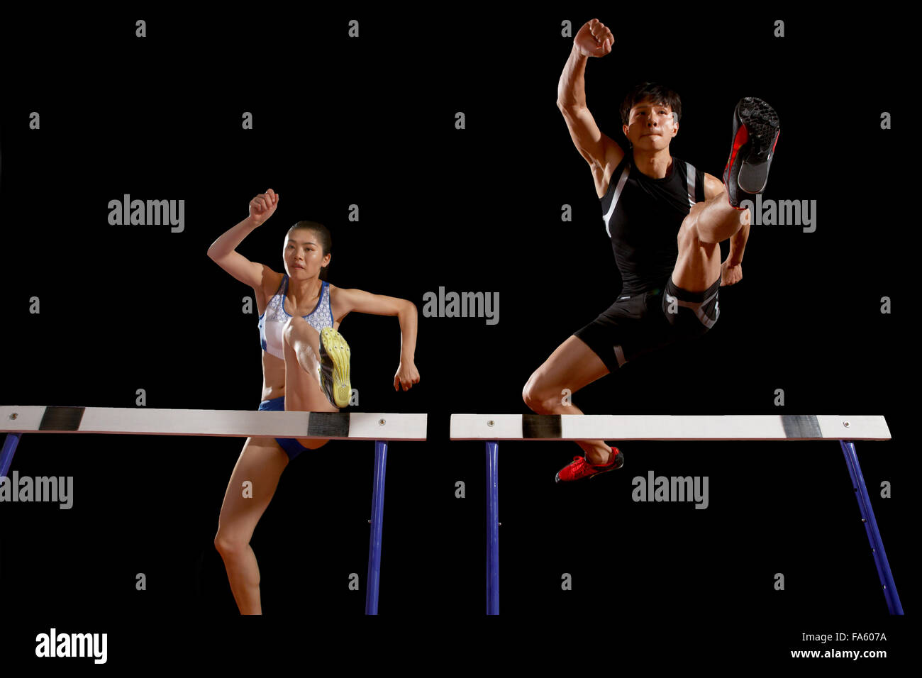 Track and field athletes in Hurdles Stock Photo Alamy