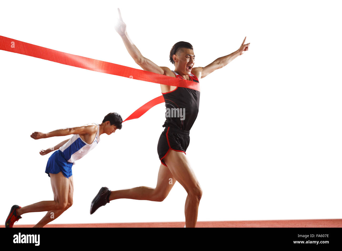 Track and field athletes to reach the finish line Stock Photo Alamy