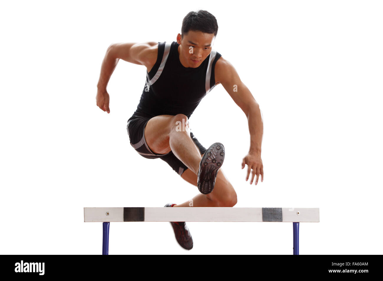 Track and field athletes to do hurdles Stock Photo Alamy