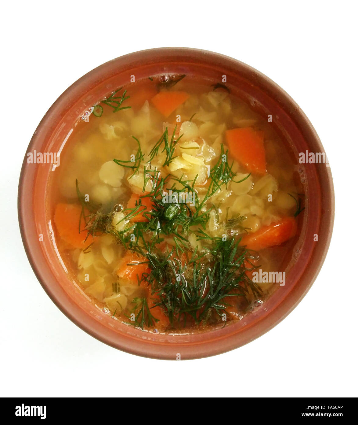 Fresh yellow lentil soup with vegetables and dill Stock Photo