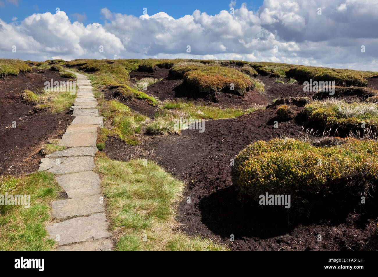 Paved footpath on the moors of Bleaklow in the High Peak, Derbyshire, England. Stock Photo