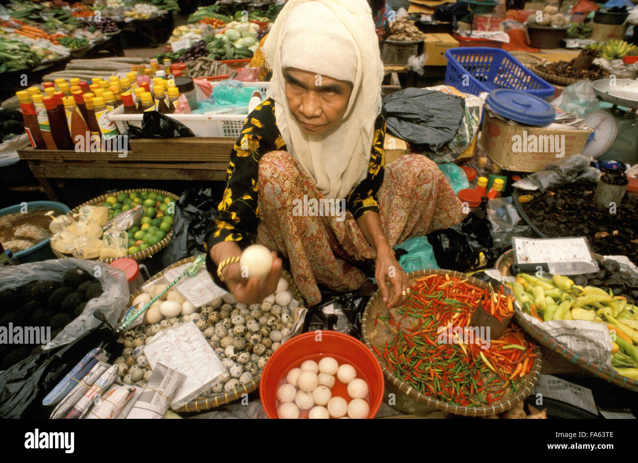 Kelantan State, Kota Bharu, Women selling fruit and vegetables in the towns central market, Malaysia. Stock Photo