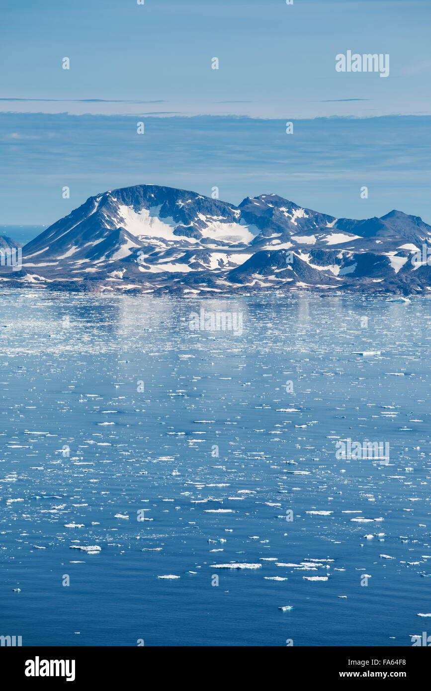 Late summer sea ice at mouth of Ammassalik Fjord, Tasiilaq, Greenland Stock Photo