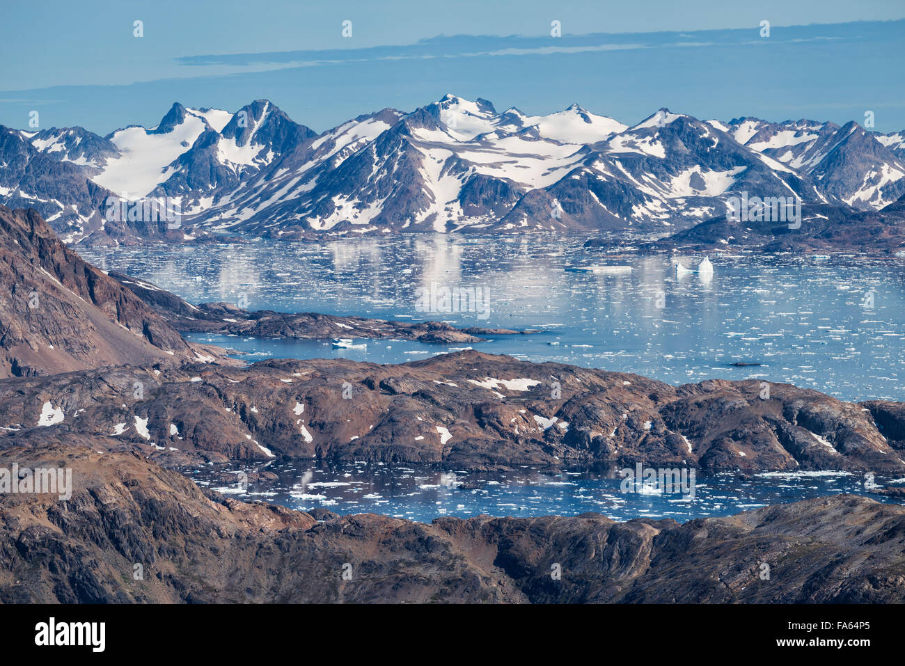 Late summer sea ice at mouth of Ammassalik Fjord, Tasiilaq, Greenland Stock Photo