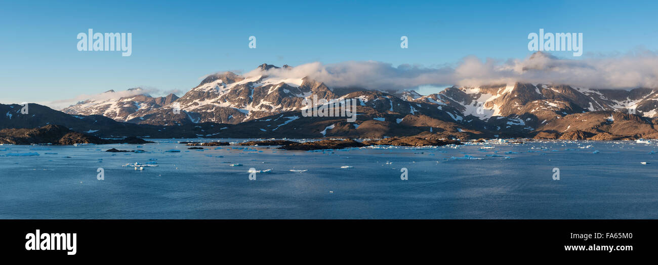 View across Kong Oscars Havn towards mountains, Tasiilaq, Greenland Stock Photo