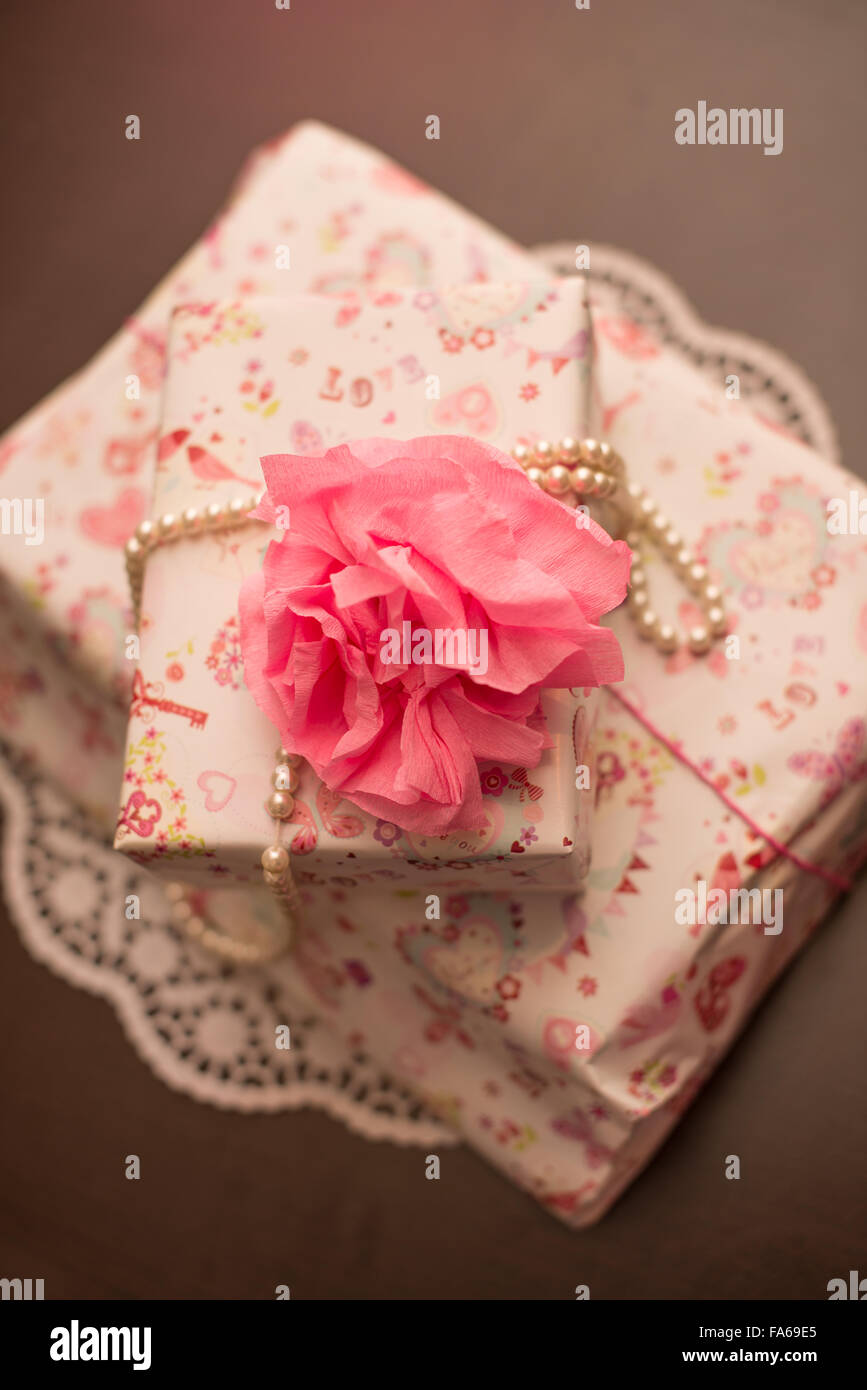 Overhead view of two pink wrapped gifts Stock Photo