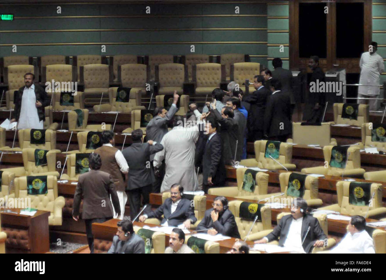 Opposition members of Sindh Assembly are protesting against the proposed curtailment in Rangers' anti-terror powers and limiting their authority to take action against facilitators of terrorism and crimes during session presiding by Speaker Agha Siraj Durrani held on Tuesday, December 22, 2015. Stock Photo
