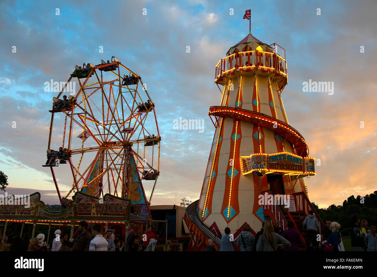 Traditional helter skelter and ferris wheel at the Bristol International Hot Air Balloon Fiesta 2015 Stock Photo