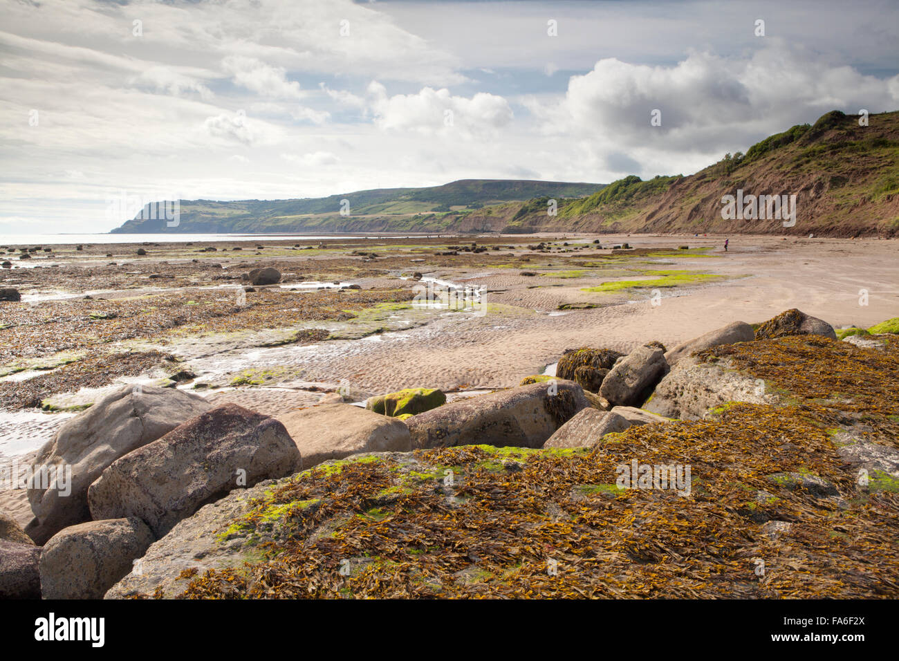 The beach at Robin Hoods Bay looking south towards Ravenscar - North Yorkshire, UK Stock Photo