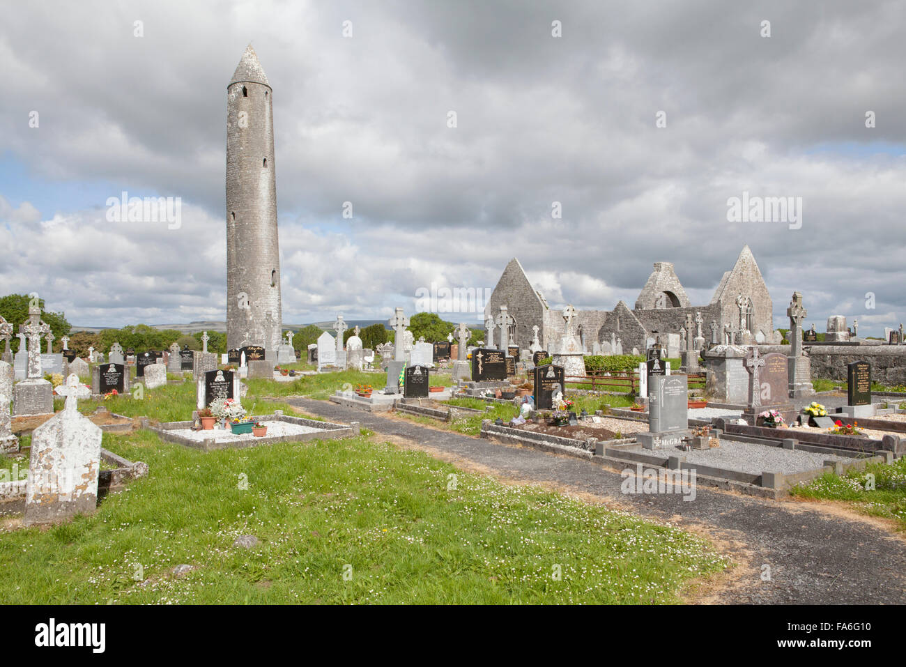 Kilmacduagh Monastery is a ruined abbey near the town of Gort in County Galway, Ireland Stock Photo