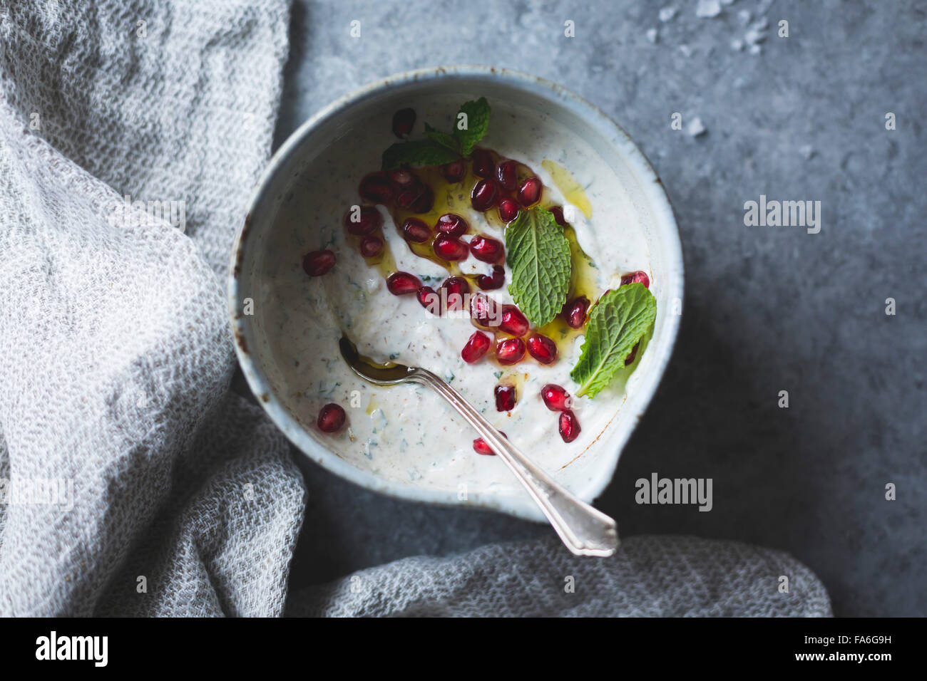Spiced garlic yogurt dip with mint. Stock Photo