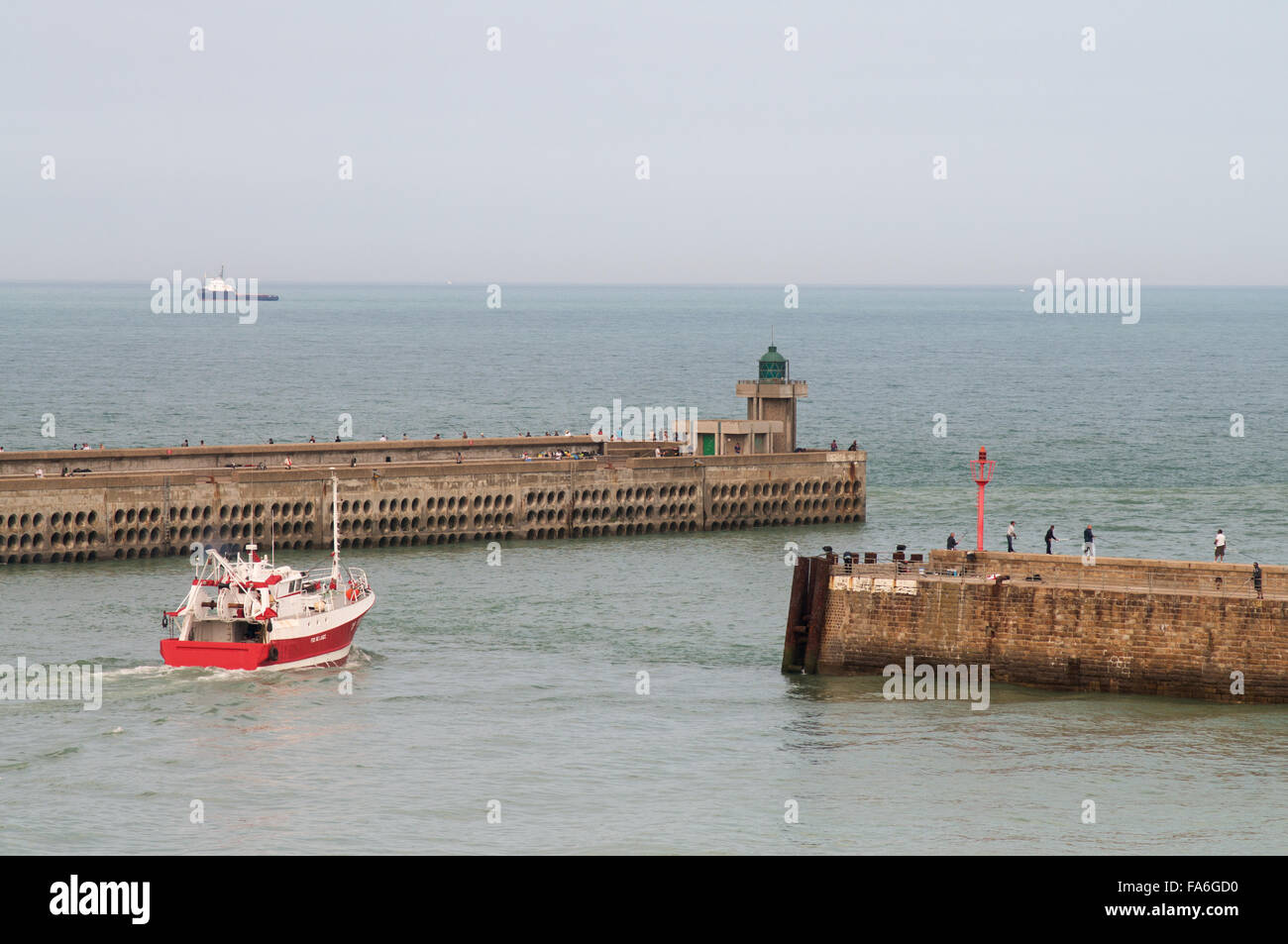 Fishing boat leaving Dieppe harbour, Seine-Maritime, Normandy, France, Europe Stock Photo