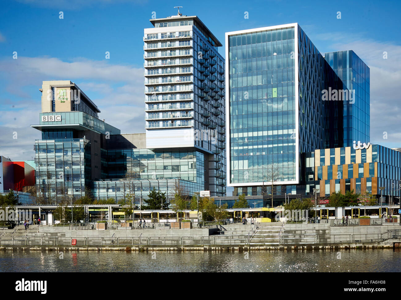 Salford Quays Mediacity home to the BBC and ITV studios in the North West   manchester  e blue sky sunny weather Stock Photo