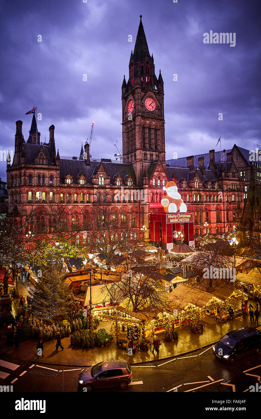 Manchester German Christmas Markets on Albert Square in front of the landmark Town Hall   Markets place training traders small b Stock Photo