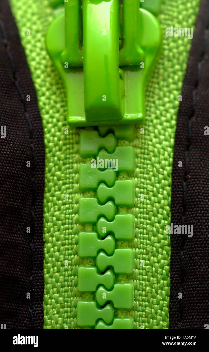 A green zipper close up Stock Photo