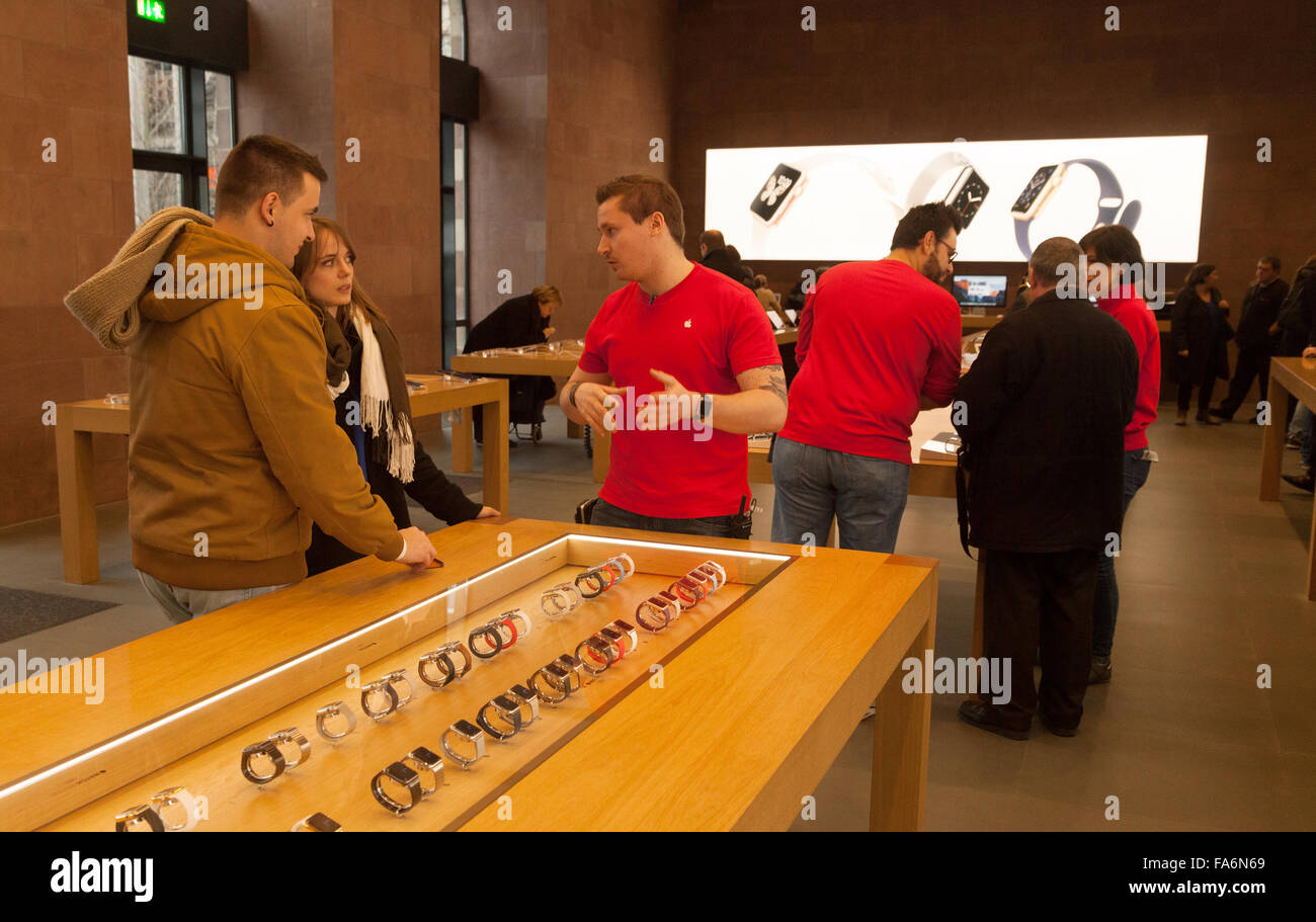 A couple shopping for an Apple Watch in the Apple store, Strasbourg, France Europe Stock Photo