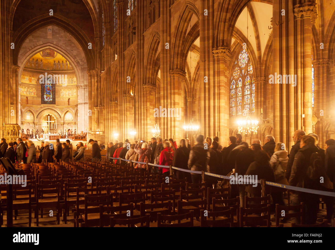 Tourists in the interior, Strasbourg Cathedral, Strasbourg, France Europe Stock Photo