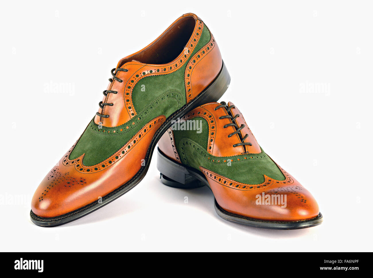 Men's Spectator Style Dress Shoes isolated Green and Brown Stock Photo