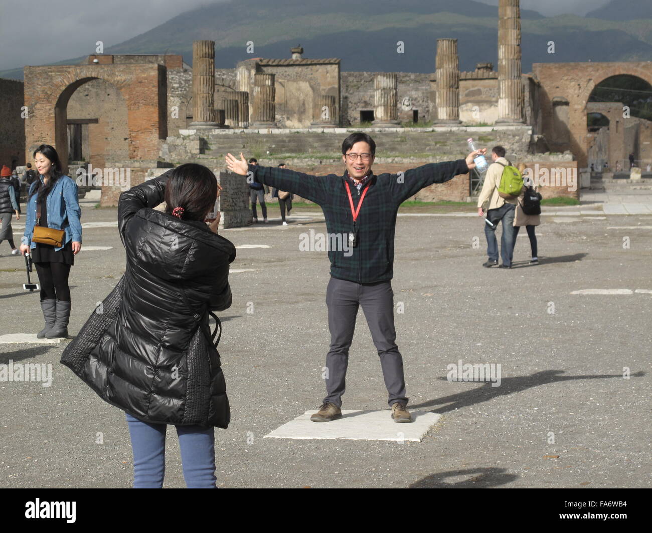 Pompeii, Italy. 1st Dec, 2015. Tourists in Pompeii, Italy, 1 December 2015. For years, ruins and even entire buildings were collapsing in Pompeii. In 2013, the EU provided a great deal of money for its rescue, since when it is being restored. PHOTO: ALVISE ARMELLINI/DPA/Alamy Live News Stock Photo