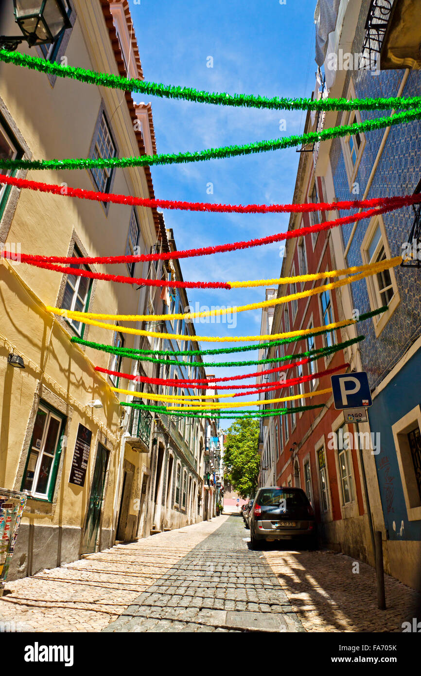 LISBON, PORTUGAL - JUNE 13, 2013: Lisbon street with holiday decoration during Lisbon Festival (Festas de Lisboa) Stock Photo