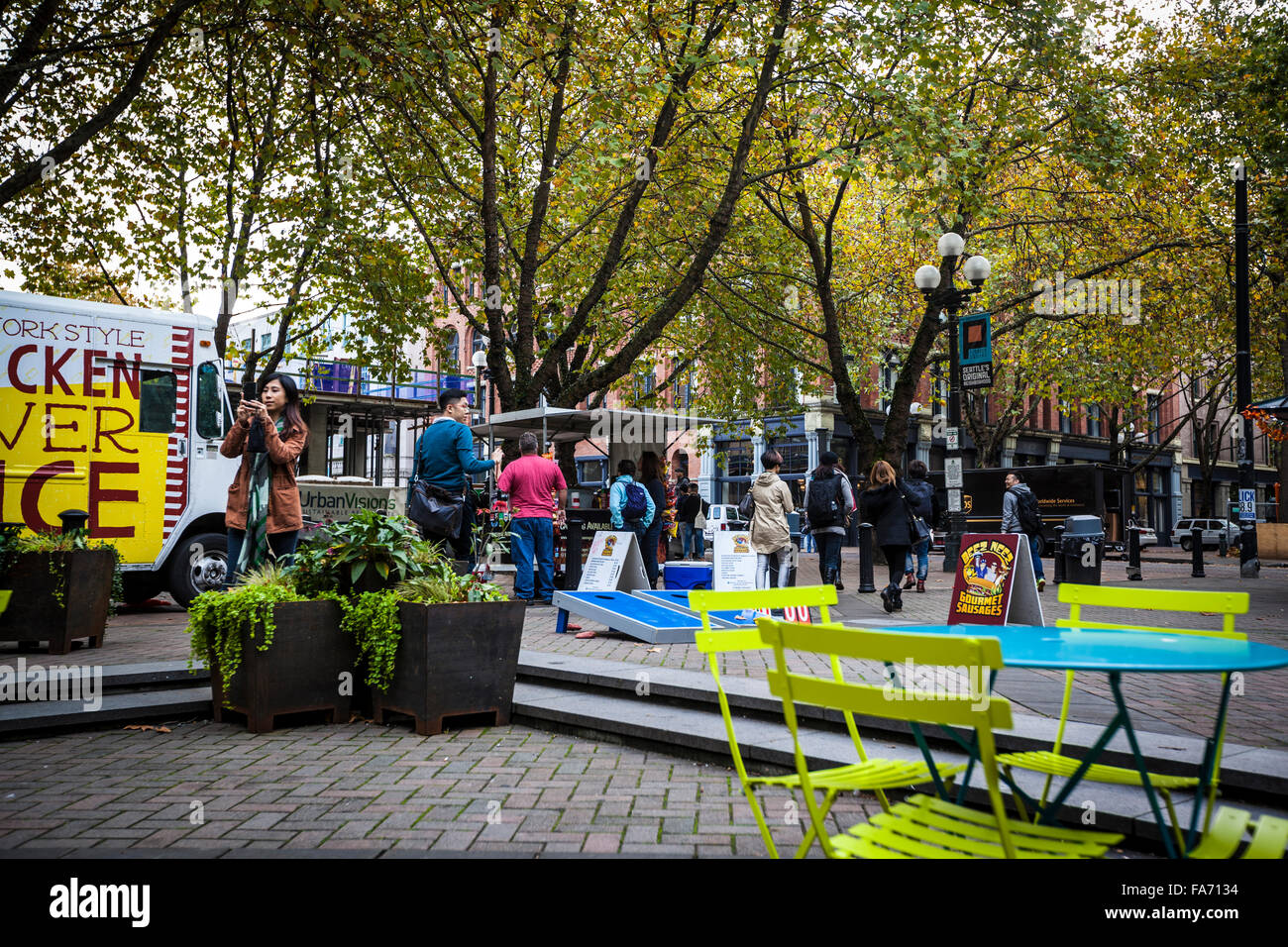 Occidental Park is in the heart of the historic Pioneer Square district Stock Photo