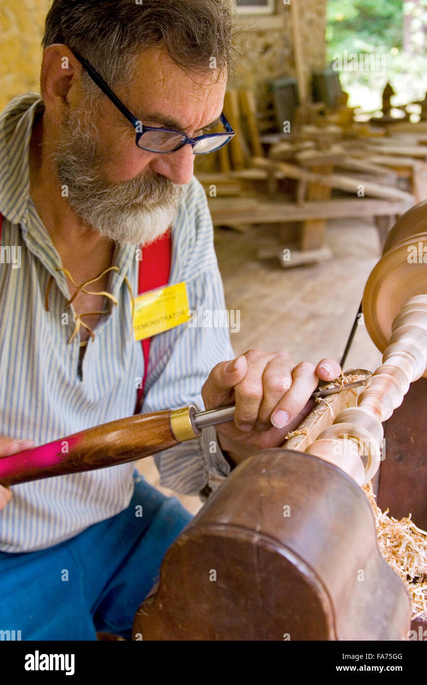 Visitors to John C Campbell folk school come to watch skilled craftspersons demonstrate traditional mountain in the fall. Stock Photo