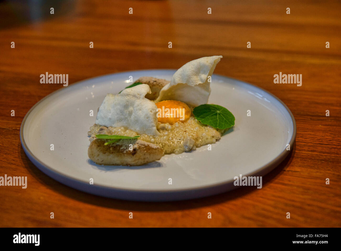 Jerusalem artichoke with an onsen egg at an elegant restaurant, Bangkok