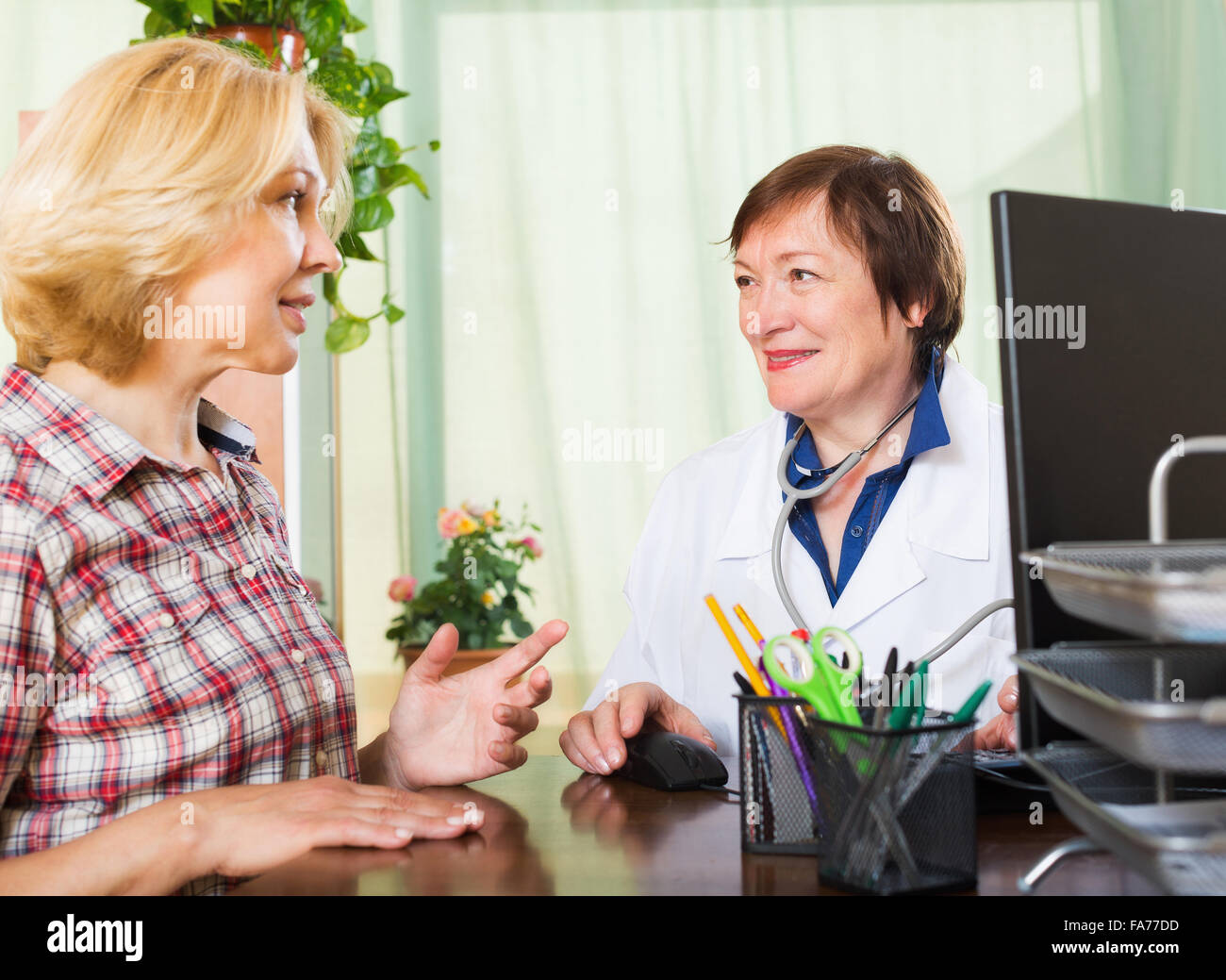 Consulting with patient hi-res stock photography and images - Alamy