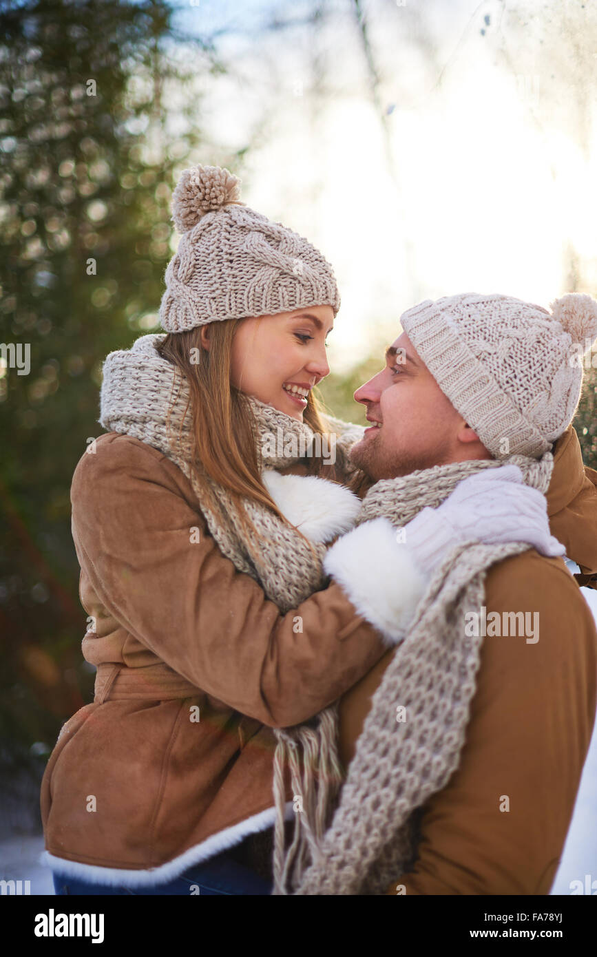 Lovely couple embracing outdoors in winter Stock Photo - Alamy