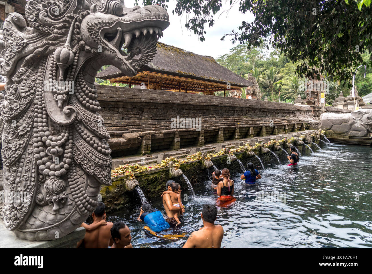 bathing structure with holy spring water of the Hindu water temple Tirta Empul near Ubud, Bali, Indonesia Stock Photo