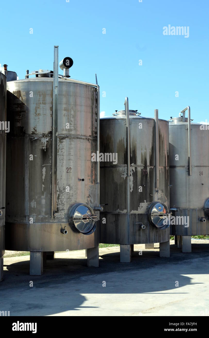 Stainless steel tanks for a fermentation of wine Modern manufacture of winemaking Stock Photo