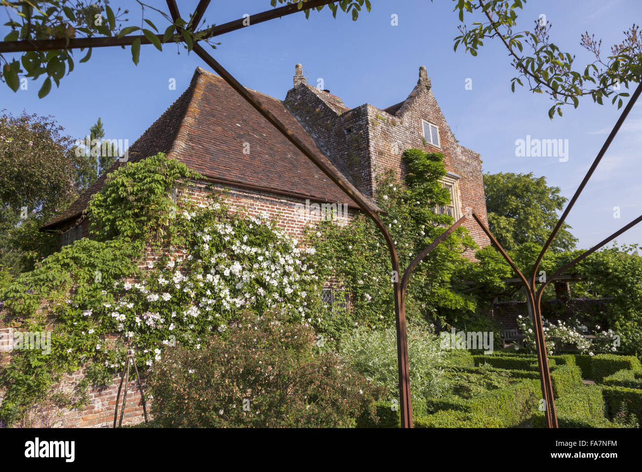 The gardens in July at Sissinghurst Castle, Kent. Sissinghurst gained international fame in the 1930s when Vita Sackville-West and Harold Nicolson created a garden there. Stock Photo