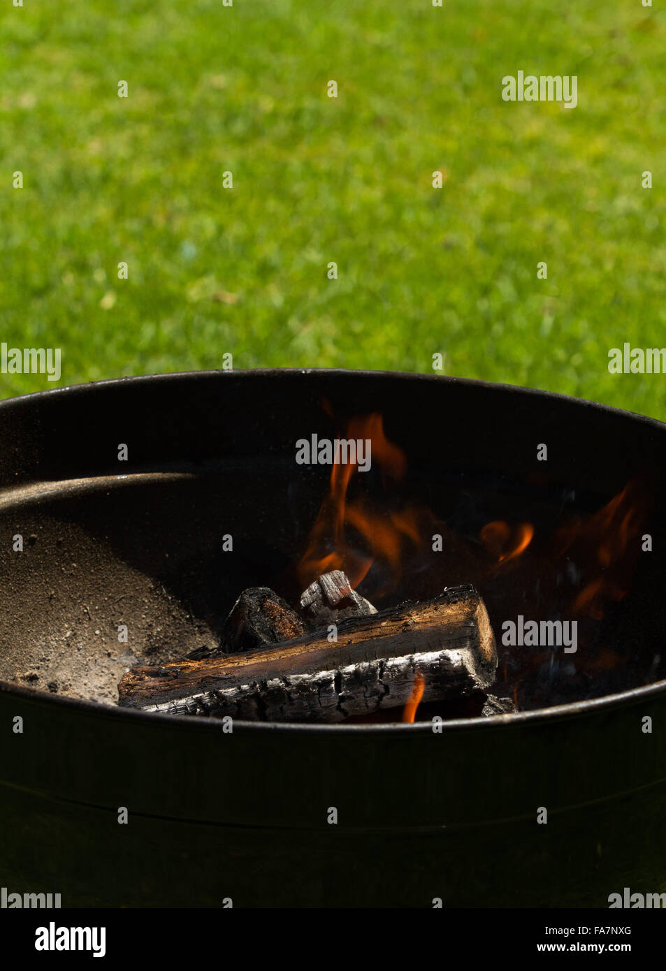 Wood fire in kettle Stock Photo Alamy