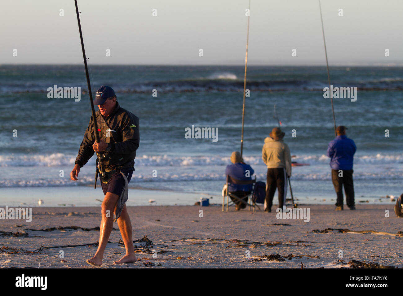 Fishermen, Melkbosstrand, Cape Town, South Africa Stock Photo