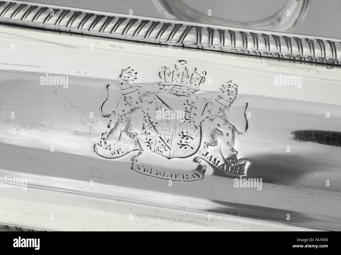 Crest on an entree dish, 1802, by Richard Cooke, part of the silver collection at Ickworth, Suffolk. National Trust inventory number: 852190 Stock Photo